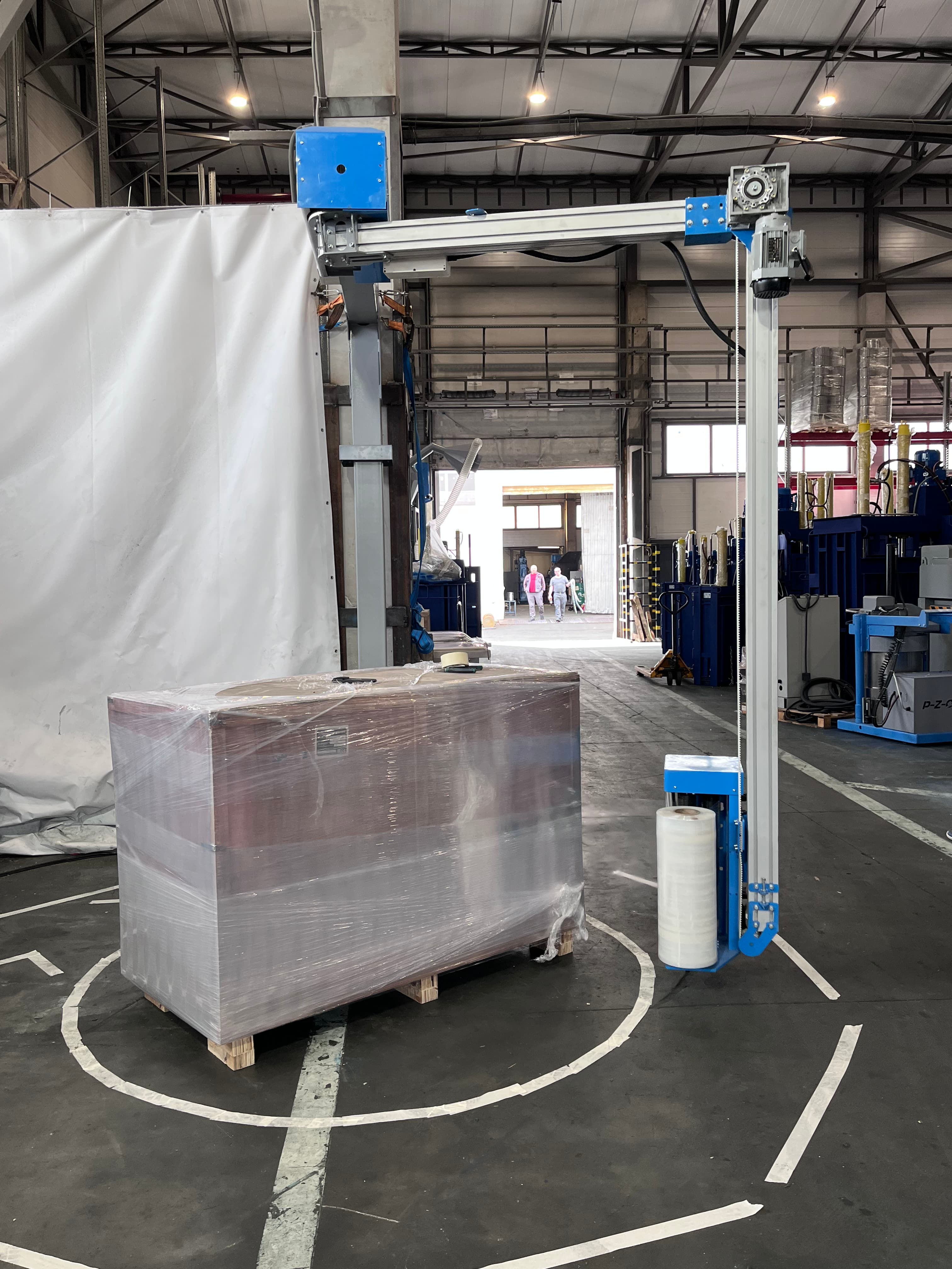 Паллетообмотчик с вращающейся рукой